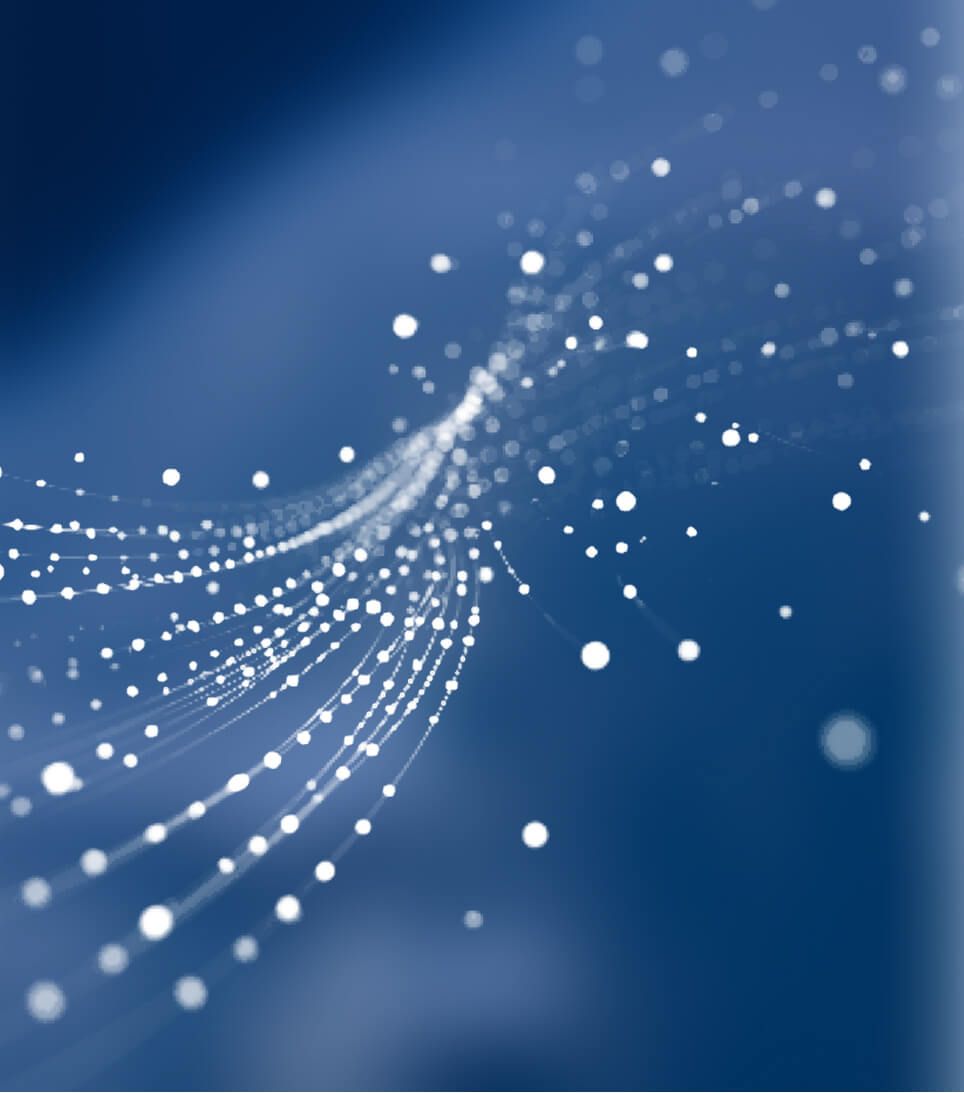 Glowing fiber optic strands with scattered light particles flowing across a deep blue background, symbolizing digital