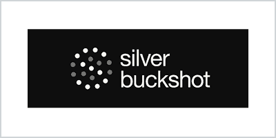 Silver Buckshot logo featuring a circular dot pattern emblem next to white text on a black background.