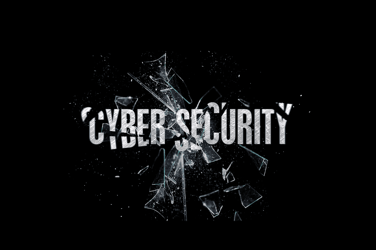 "Cyber Security" text shattered with broken glass shards flying outward against a black background.